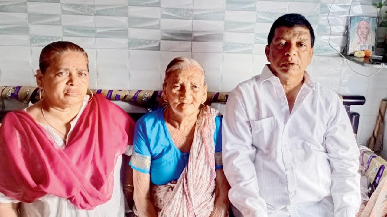 Vishwanath Gharat with his mother and sister