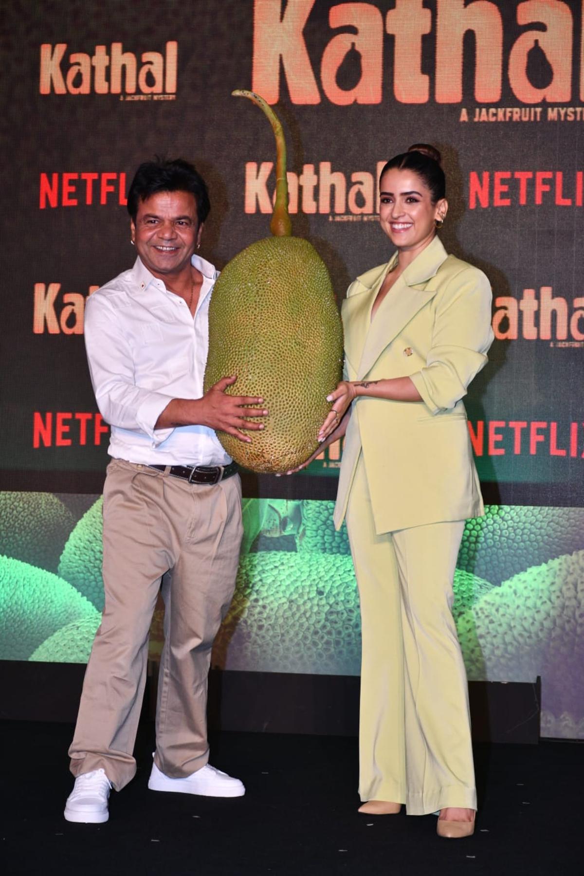 Rajpal Yadav, who will be seen essaying the role of a journalist in 'Kathal', was also seen holding the jackfruit while posing with Sanya for the photogs. 
