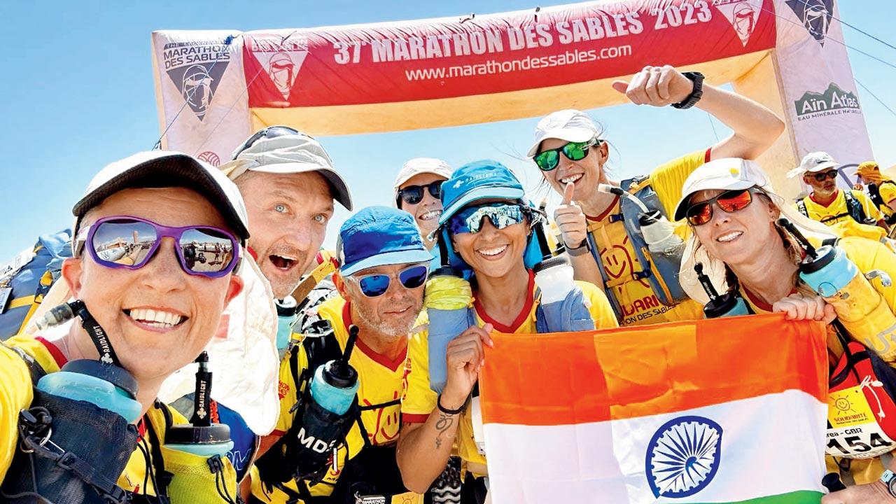 Ghosh with other participants after finishing the foot race  on April 29 