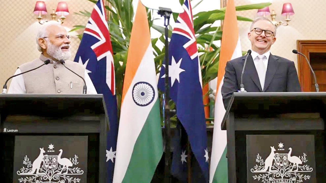 Modi in Australia strikes new deals