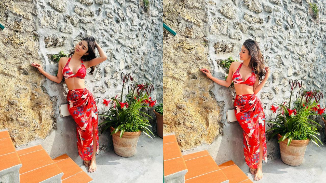 Mouni Roy picked a red co-ord set that came with contrasting prints and paired a plunging neckline bikini top with a slit skirt that made for a perfect outfit in Italy.