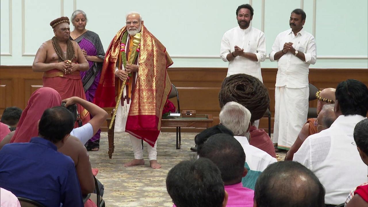 PM Modi receives 'Sengol' from an Adheenam on eve of new Parliament building inauguration. Pic/PTI