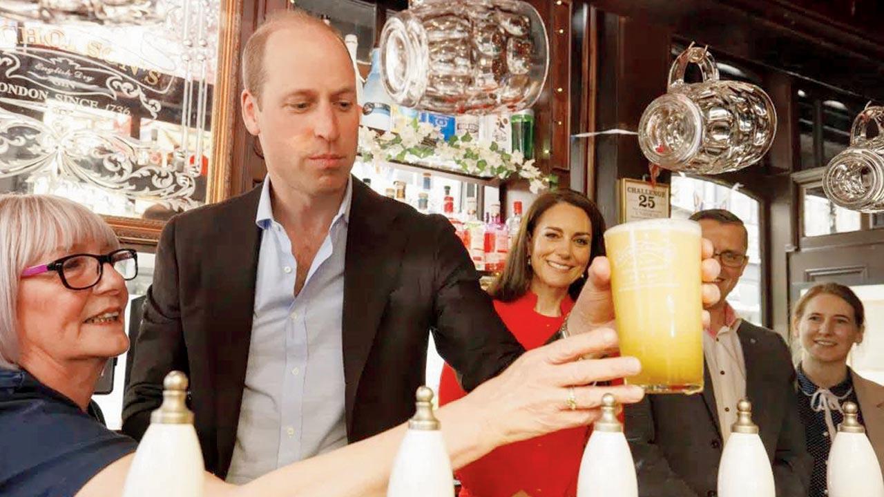 Prince William pours a pint, meets public before coronation