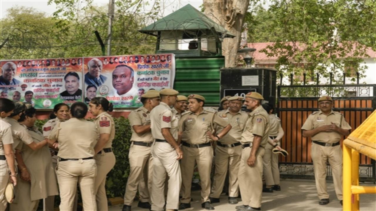 Security personnel stand guard outside the residence of Congress President Mallikarjun Kharge, in New Delhi, Tuesday, May 16, 2023. In just-concluded Assembly elections, the Congress scored an emphatic victory with 135 seats while the ruling BJP and the former Prime Minister H D Deve Gowda-led Janata Dal (Secular) secured 66 and 19 seats, respectively. PTI Photo