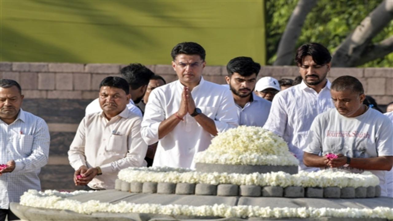 Congress leader Sachin Pilot pays tribute to former prime minister Rajiv Gandhi on his 32nd death anniversary at Veer Bhoomi of Rajghat in New Delhi on Sunday. ANI Photo
