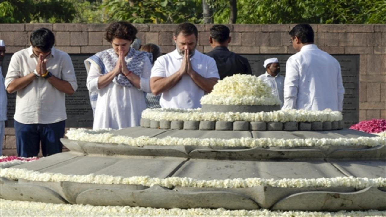 Congress leader Rahul Gandhi with party general secretary Priyanka Gandhi Vadra and her son Raihan Vadra pay tribute to former prime minister Rajiv Gandhi on his 32nd death anniversary at Veer Bhoomi of Rajghat in New Delhi on Sunday. ANI Photo