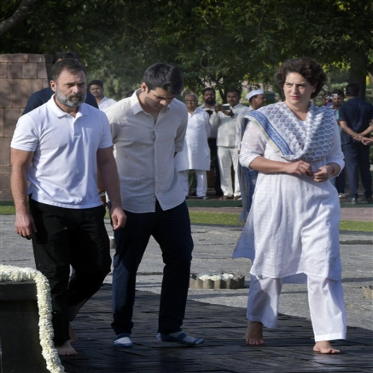 Congress leader Rahul Gandhi with party general secretary Priyanka Gandhi Vadra and her son Raihan Vadra arrive to pay tribute to former prime minister Rajiv Gandhi on his 32nd death anniversary at Veer Bhoomi of Rajghat in New Delhi on Sunday. ANI Photo