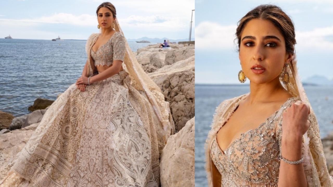 Sara Ali Khan Her red carpet look at Cannes 2023 came as a shock to many when the actress was seen pulling off an exquisite hand-embroidered ivory lehenga by Abu Jani Sandeep Khosla for her debut at the film festival. The veil that went along with the lehenga added to the bridal look. Her fans called it the true representation of India on the international stage. While Khan opted for an empty neck, she wore dangling stone earrings along with a bracelet. Photo Courtesy: Instagram/Sara Ali Khan, Abu Jani Sandeep Khosla