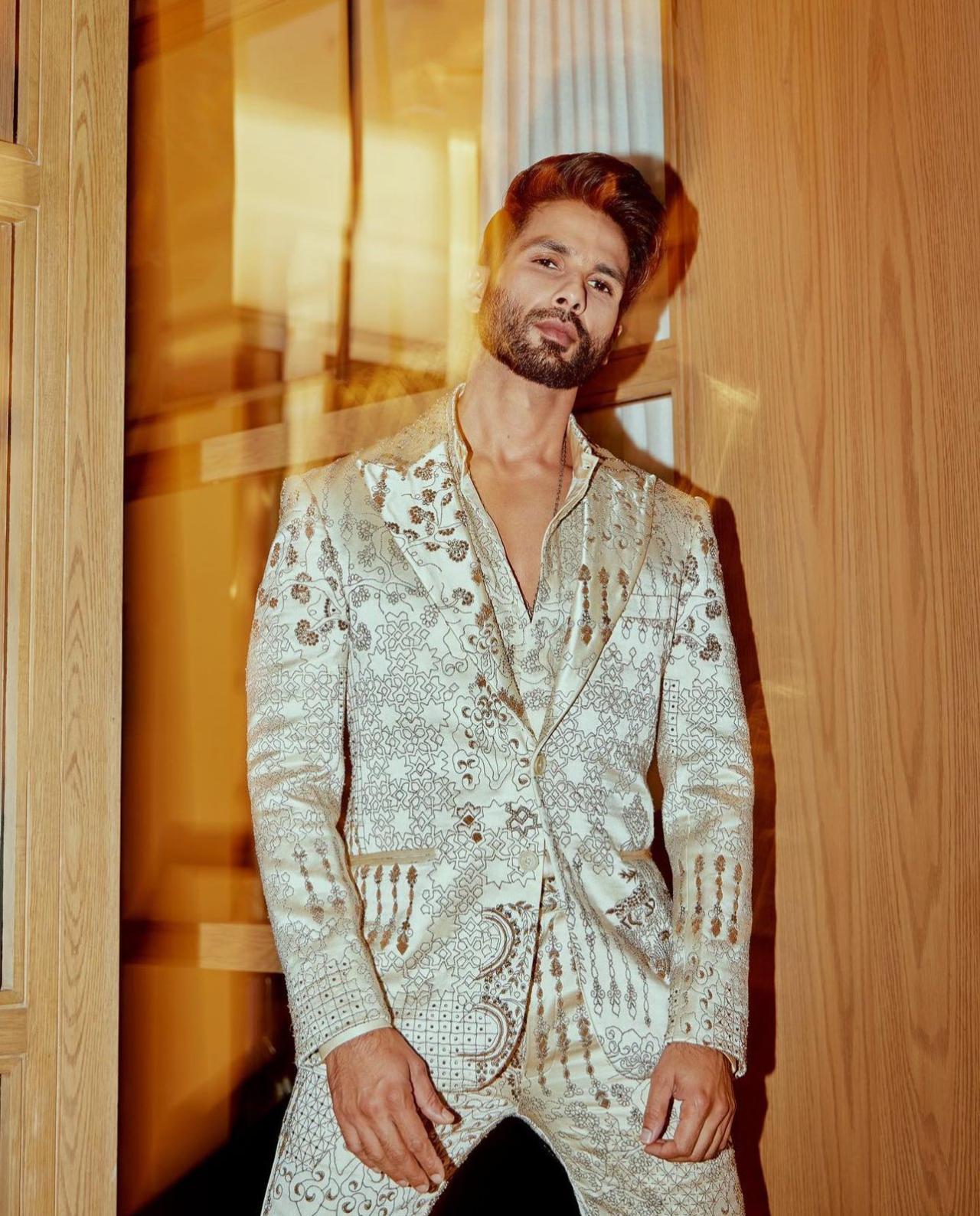 Shahid Kapoor has not only mesmerised us with his versatile acting skills but has also captivated our attention with his bold and fashion-forward sense of style. From his early days as a chocolate boy to now carving his own niche, Shahid always dresses according to his own whims. His recent appearance at NMACC in a custom silver suit with contemporary detailing showcased his ability to make bold fashion choices.