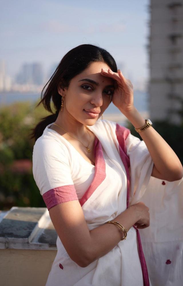 Sobhita took to her Instagram feed and shared pictures of her dressed in a white saree with red border