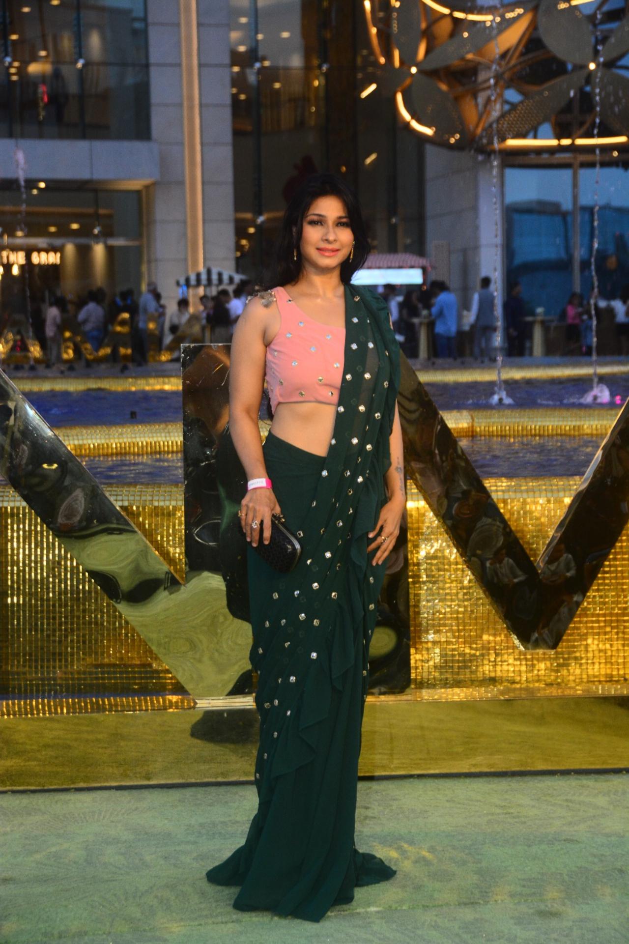 Actress Tanishaa Mukerji was seen in a pink and green saree for the night