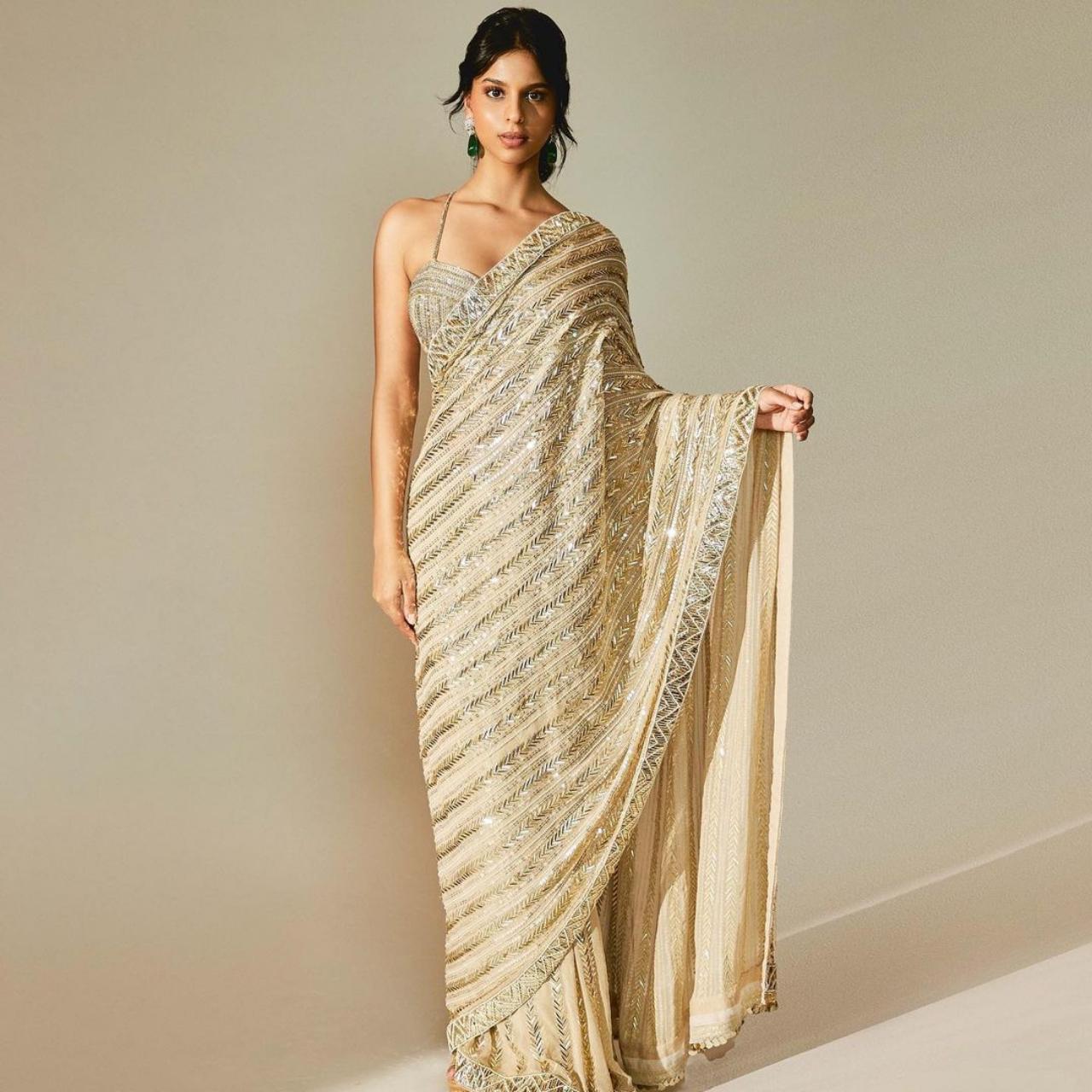 With an everdying love for saree, Suhana looks breathtaking in the ecru Manish Malhotra saree. As Suhana shared her look on Instagram, actor-father Shah Rukh Khan took to the comments section as he wrote, 