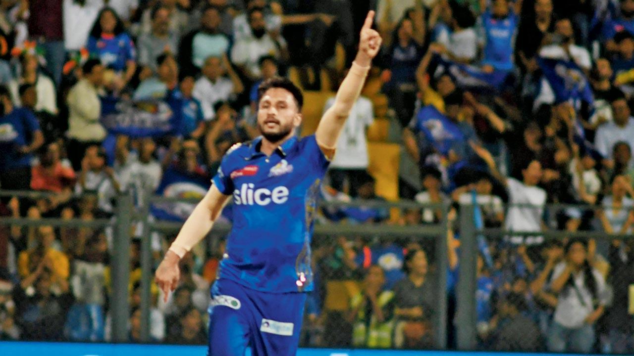 Akash Madhwal celebrates a GT wicket on Friday