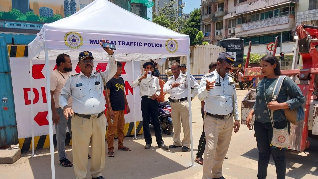 IN PHOTOS: As heat rises in Mumbai, traffic cops get some relief