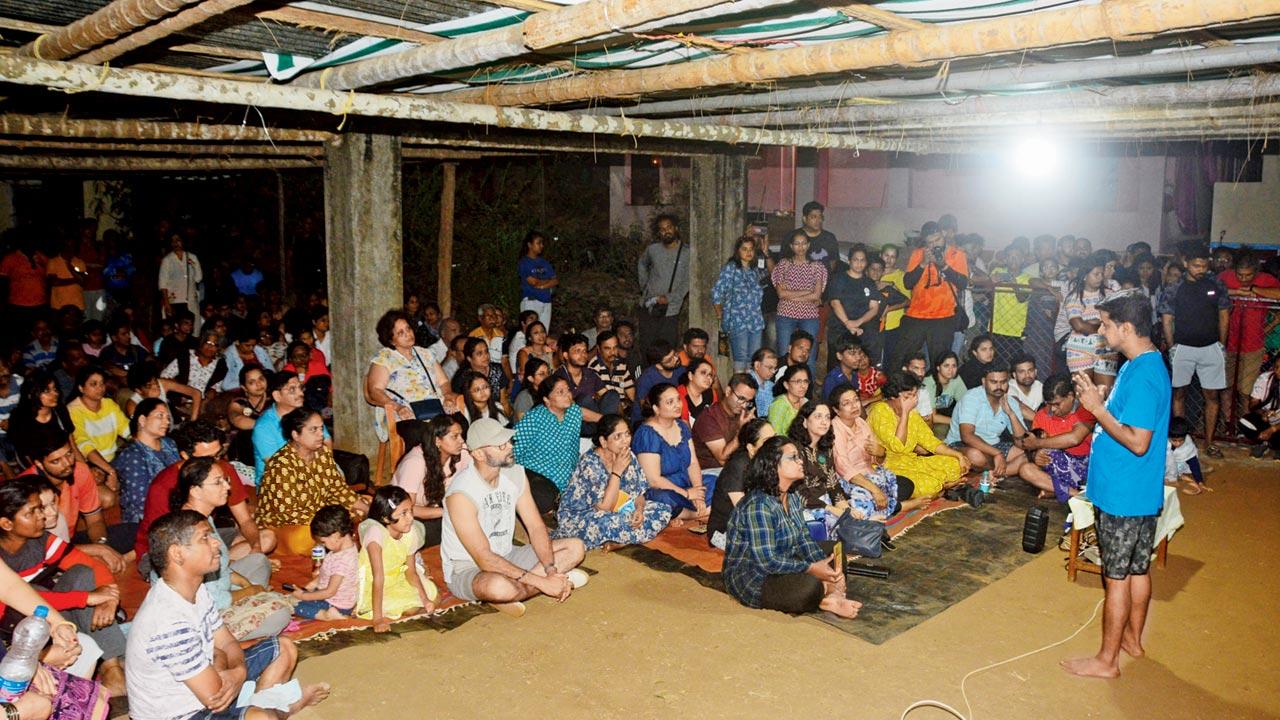 Upadhyay and fellow villagers conduct an awareness session on Olive Ridley turtles for visitors at Velas