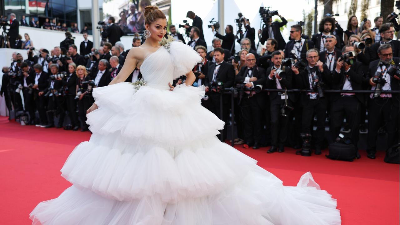 Urvashi Rautela picked a pristine white gown shelved by international ace designer Tony Ward Couture and looked absolutely stunning. This year, the actress will walk down the carpet for playing the leading lady in Parveen Babi's biopic. Photo Courtesy: AFP