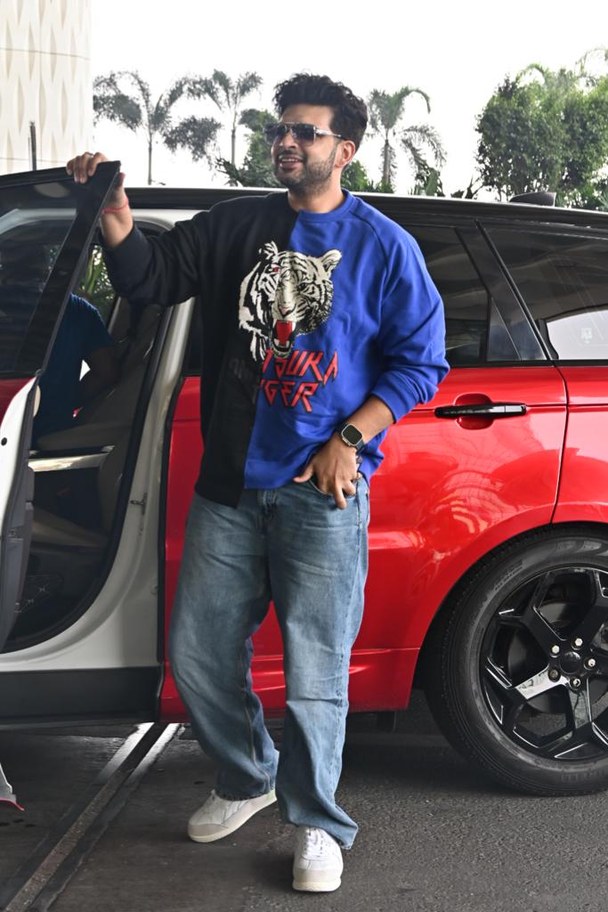 Karan Kundra wore a comfortable blue sweatshirt along with matching jeans