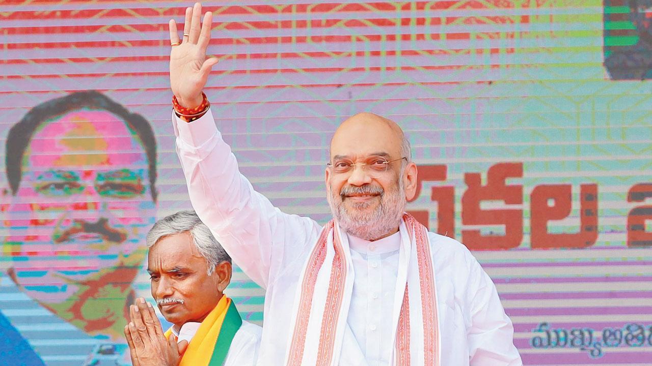 Amit Shah and a newspaper