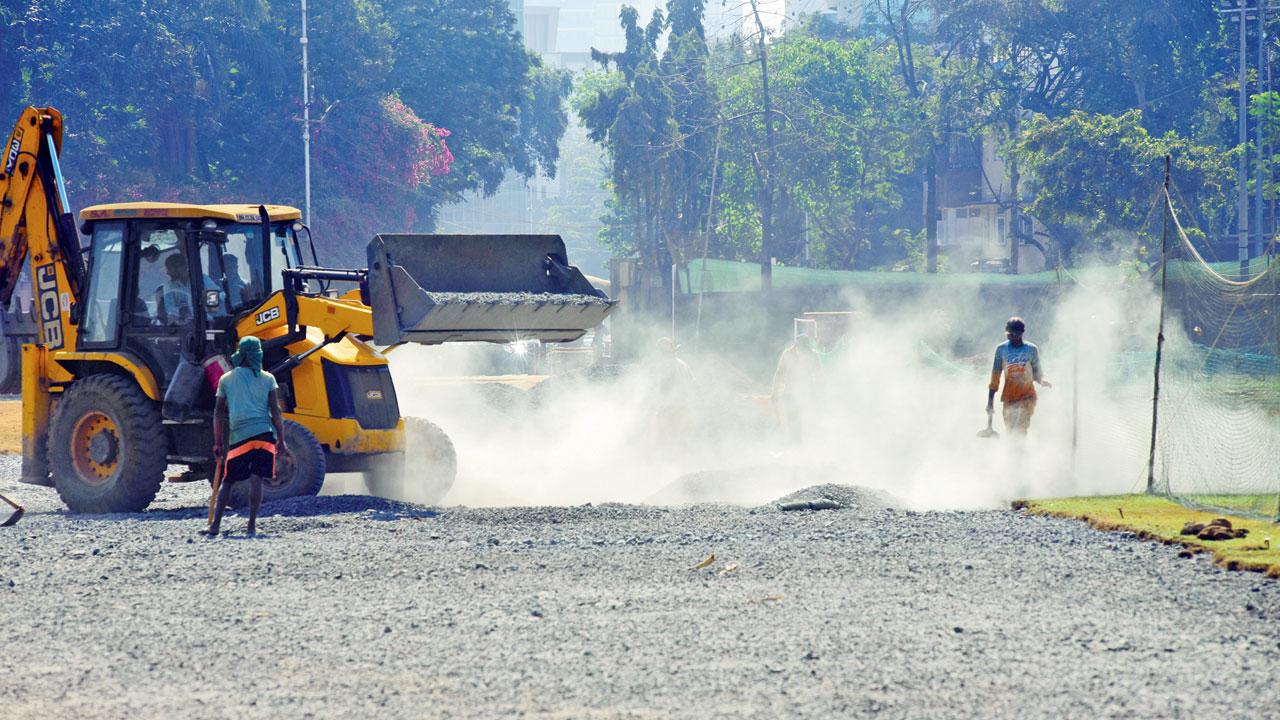 Apart from raising barriers around construction sites, builders also have to keep construction material covered. File Pic/Atul Kamble