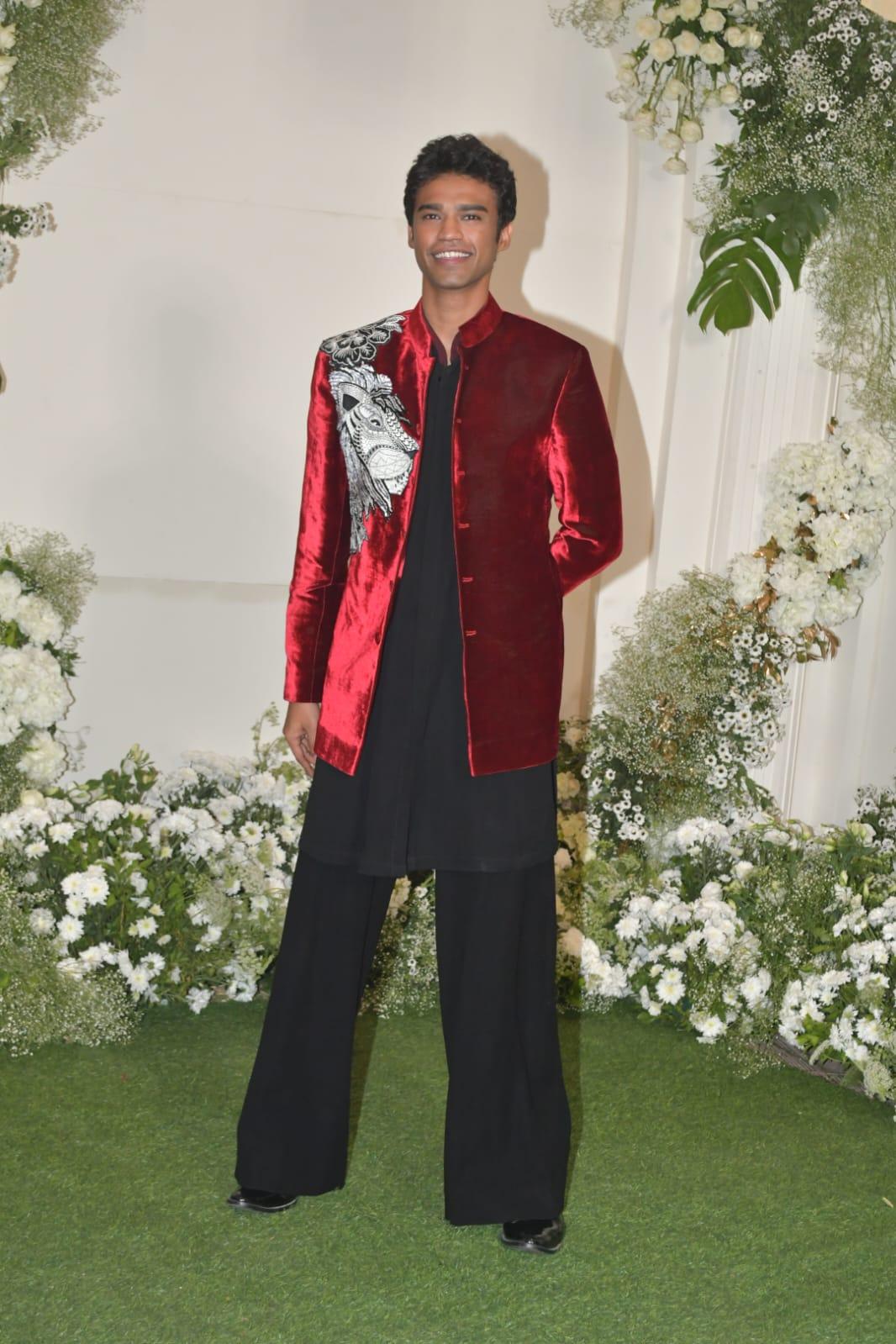 Babil Khan wore an all-black outfit and paired it with a stunning red velvet jacket