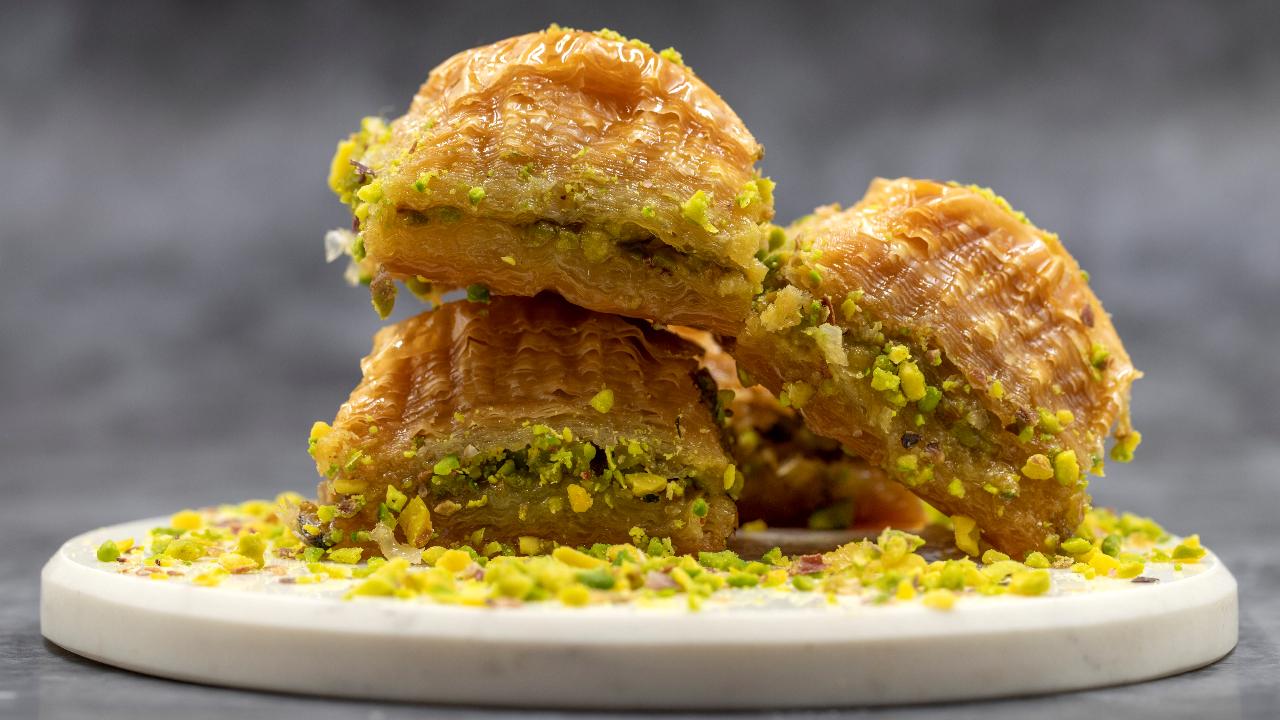 Patil says the baklava is meticulously crafted, layer by layer, ensuring a perfect balance of flaky pastry, rich nuts, and sweet honey. The cylindrical shape not only enhances the presentation but also allows for a delightful play of textures with every bite. The distinctive serving style, says Patil, aims to engage diners visually and adds an element of anticipation as they indulge in the layers of flavour.