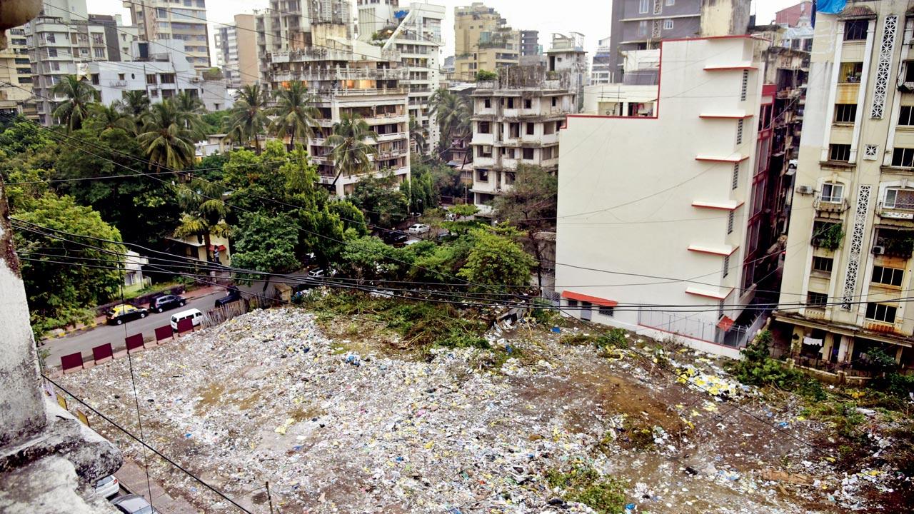 BMC recently cleared debris and waste from an open plot at Pali Naka, Bandra West. Pic/Atul Kamble