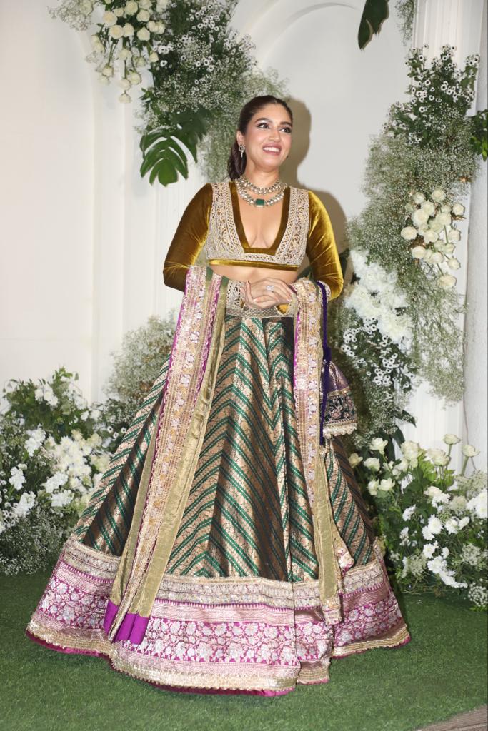 Bhumi Pednekar put her best foot forward as the actress wore a stunning green lehenga with heavy borders of contrasting pink color. The actress combined it with a yellow blouse and a pink dupatta
