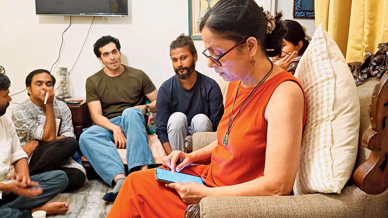 A participant recites her works at a previous edition of the baithak