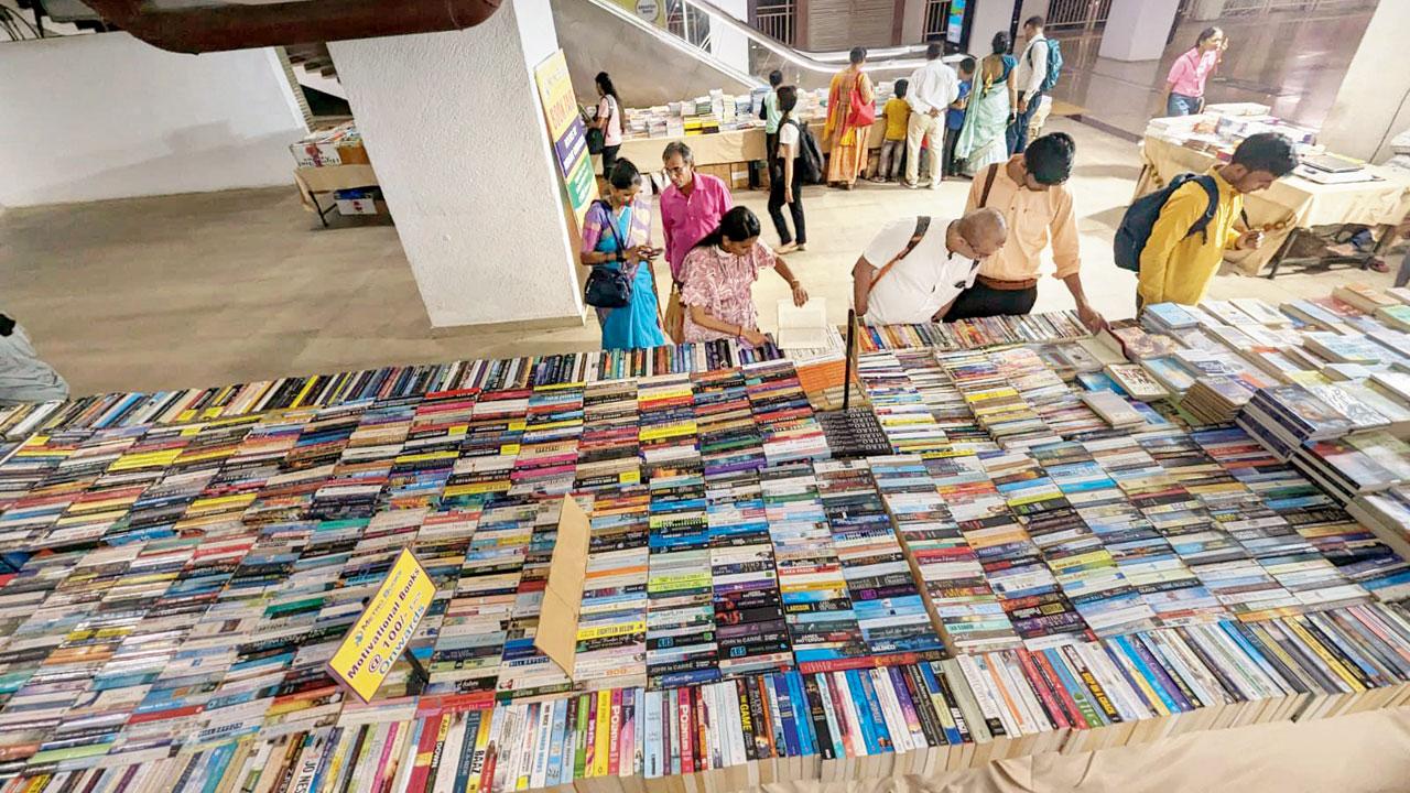 Commuters check out the books on sale