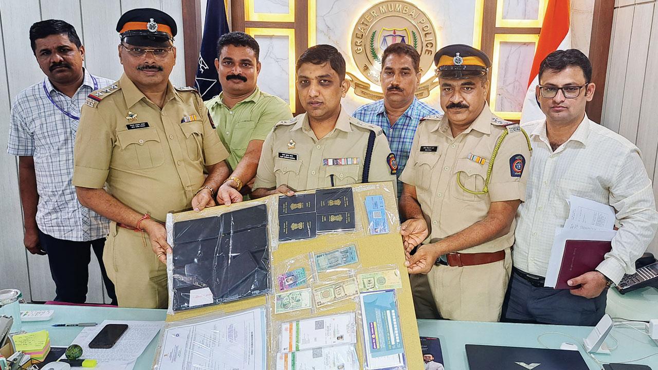 The cops display items seized from the accused last month