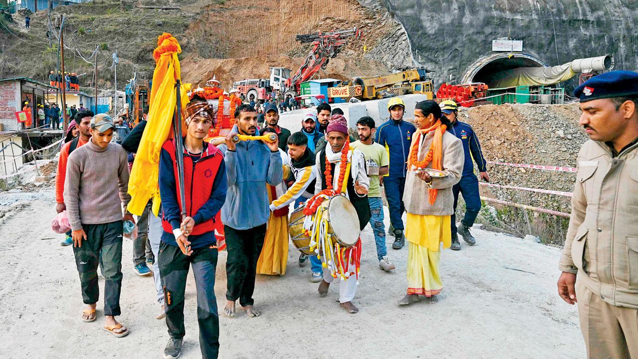 Locals worship deity ‘Boukhnag’ as they believe that the removal of the temple to make way for the infra project has angered the god. Pic/PTI