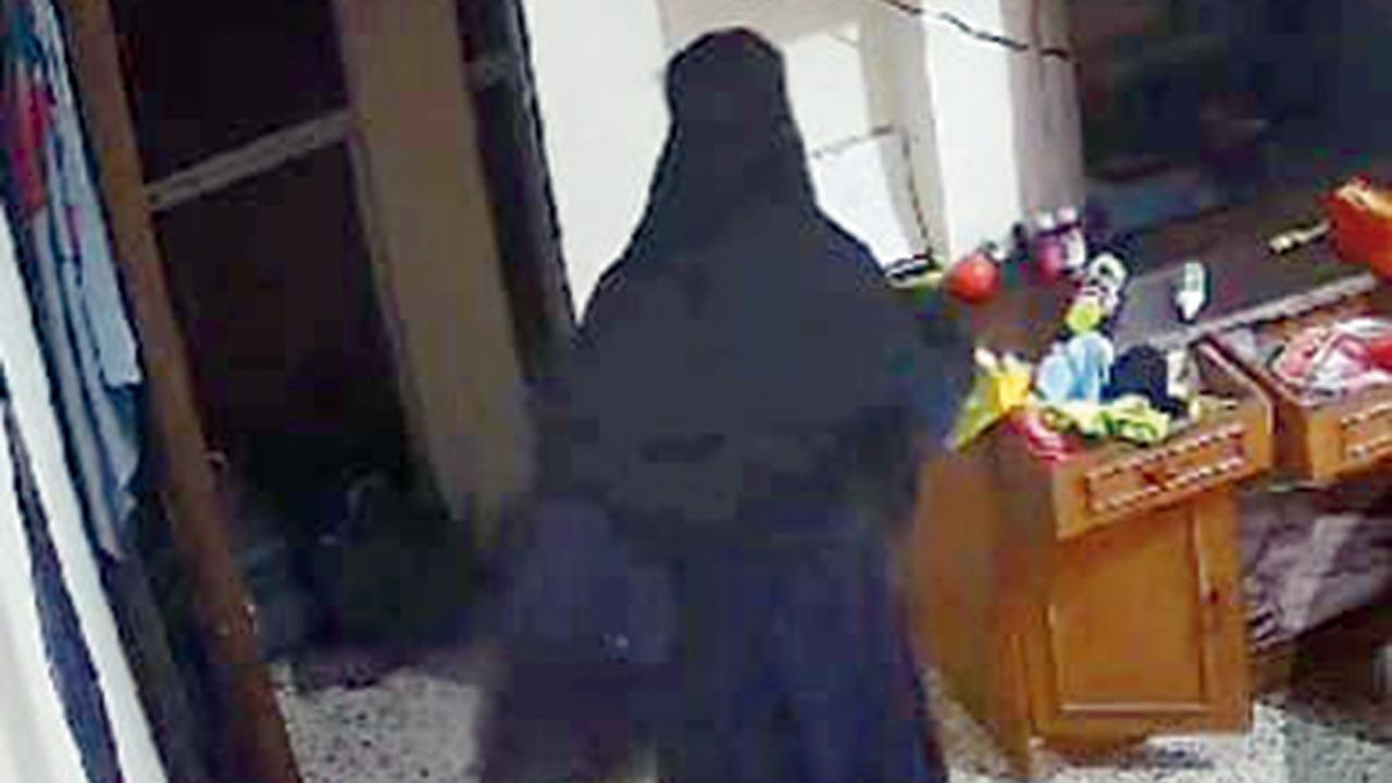 CCTV grabs show Raees Shaikh inside the Marol residence, with and without the burqa, while committing the theft