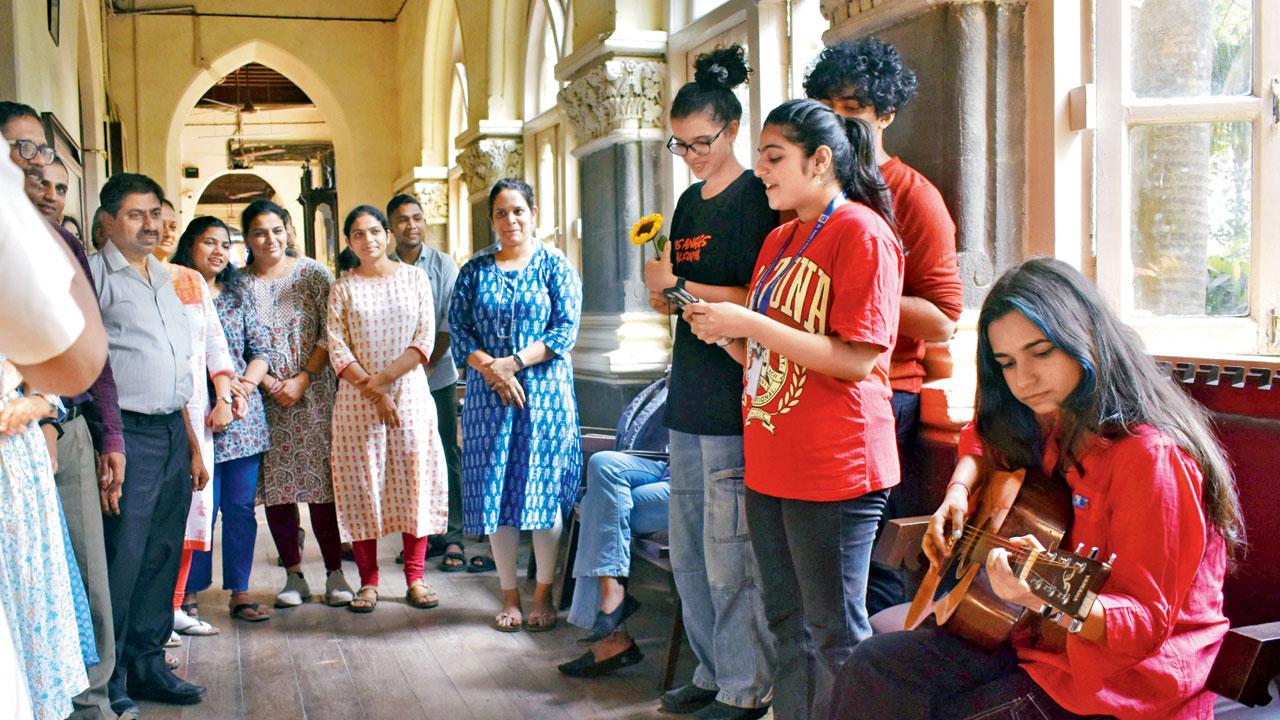 Students perform for the staff