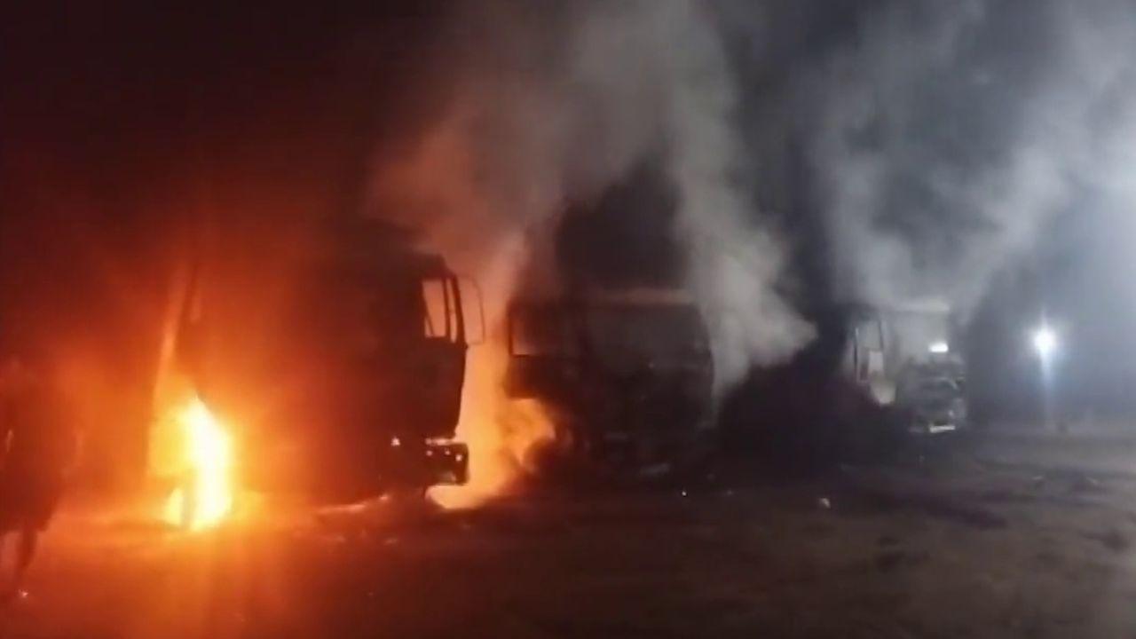 As per eyewitnesses, 40 to 50 unidentified people, clad as civilians and a few of them armed, reached the spot and set ablaze 14 vehicles and machines.