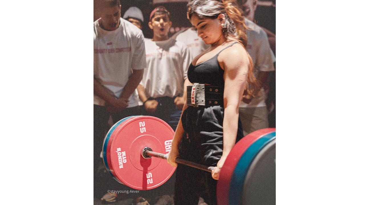 A participant lifts weights at an earlier edition of the DeadLift Party