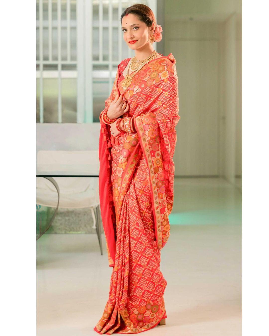 This Diwali give yourself a chance to shine and choose Ankita Lokhande's stunning, heavily embroidered orange saree