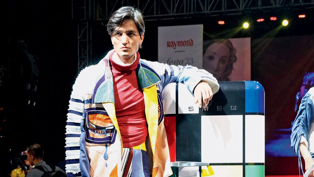 A model poses during the fashion show by Istituto Marangoni at the event