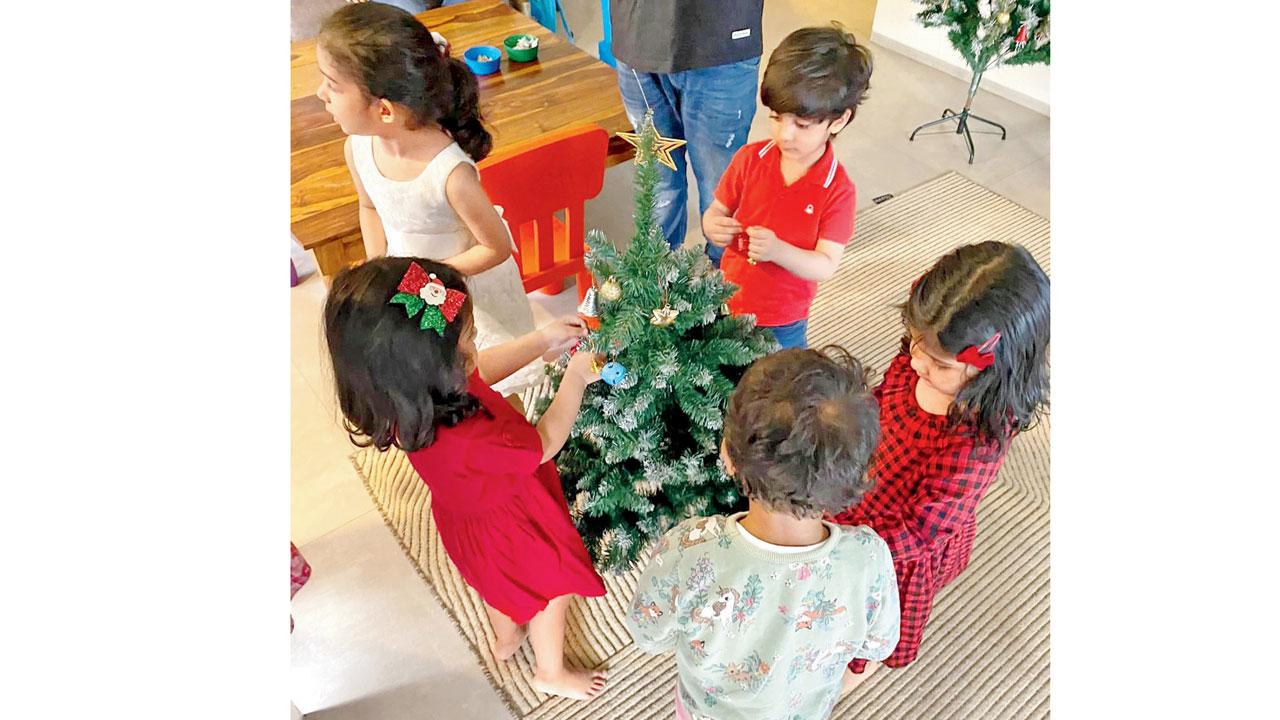 A Christmas tree decoration session