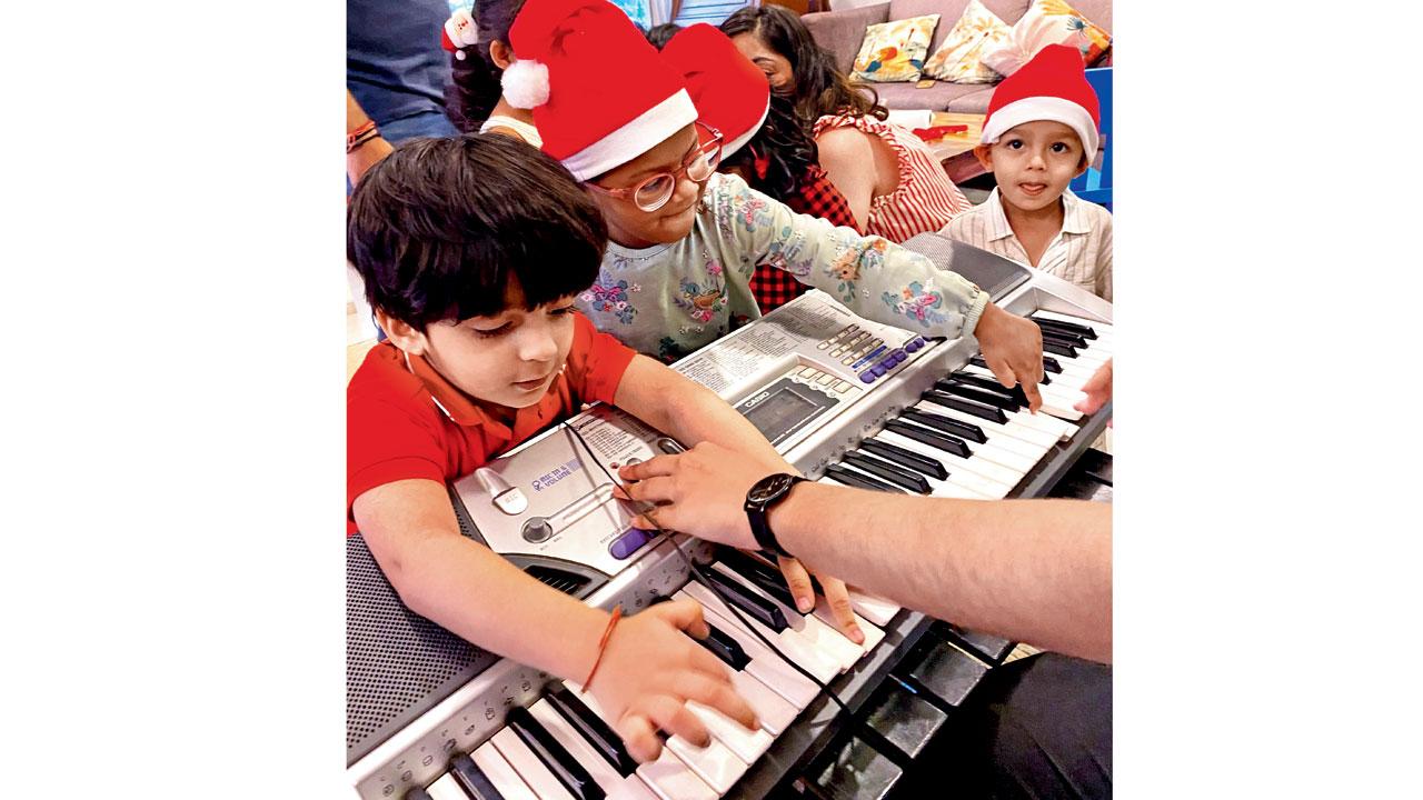 Kids at a music class from a previous edition