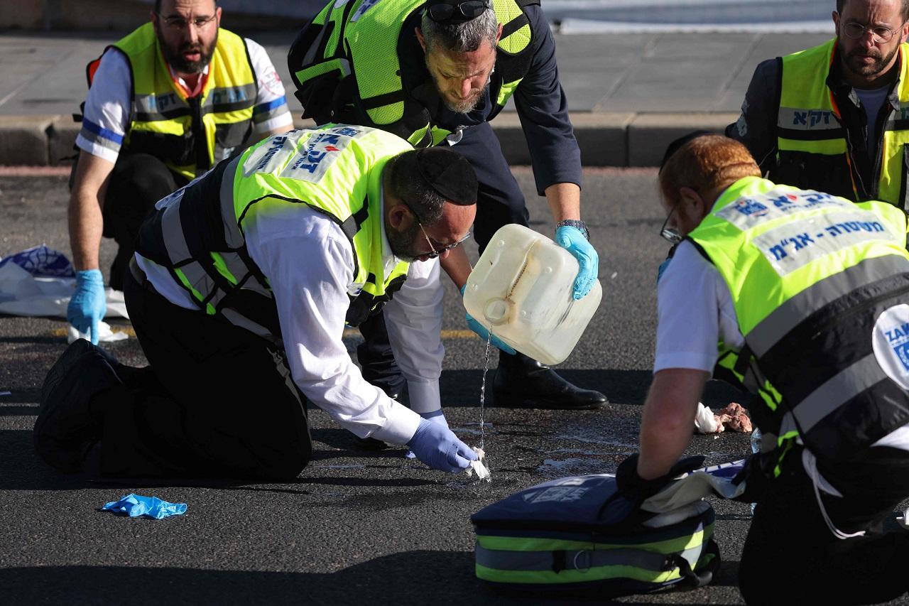 Videos circulating on social media platforms show a handful of people waiting at the bus stop starting to run away in different directions as the two gunmen start firing indiscriminately