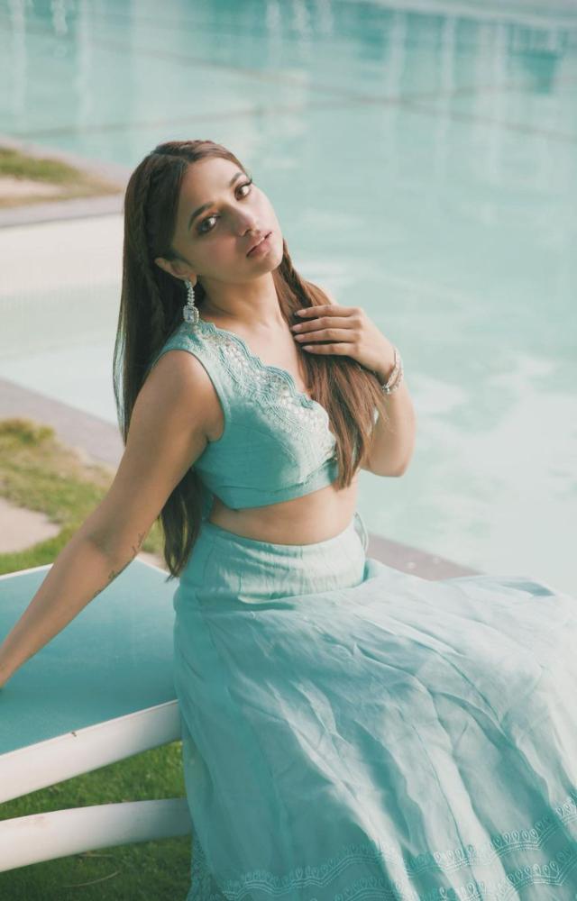 This Diwali give yourself a chance to shine and choose Jiya`s stunning blue lehenga set