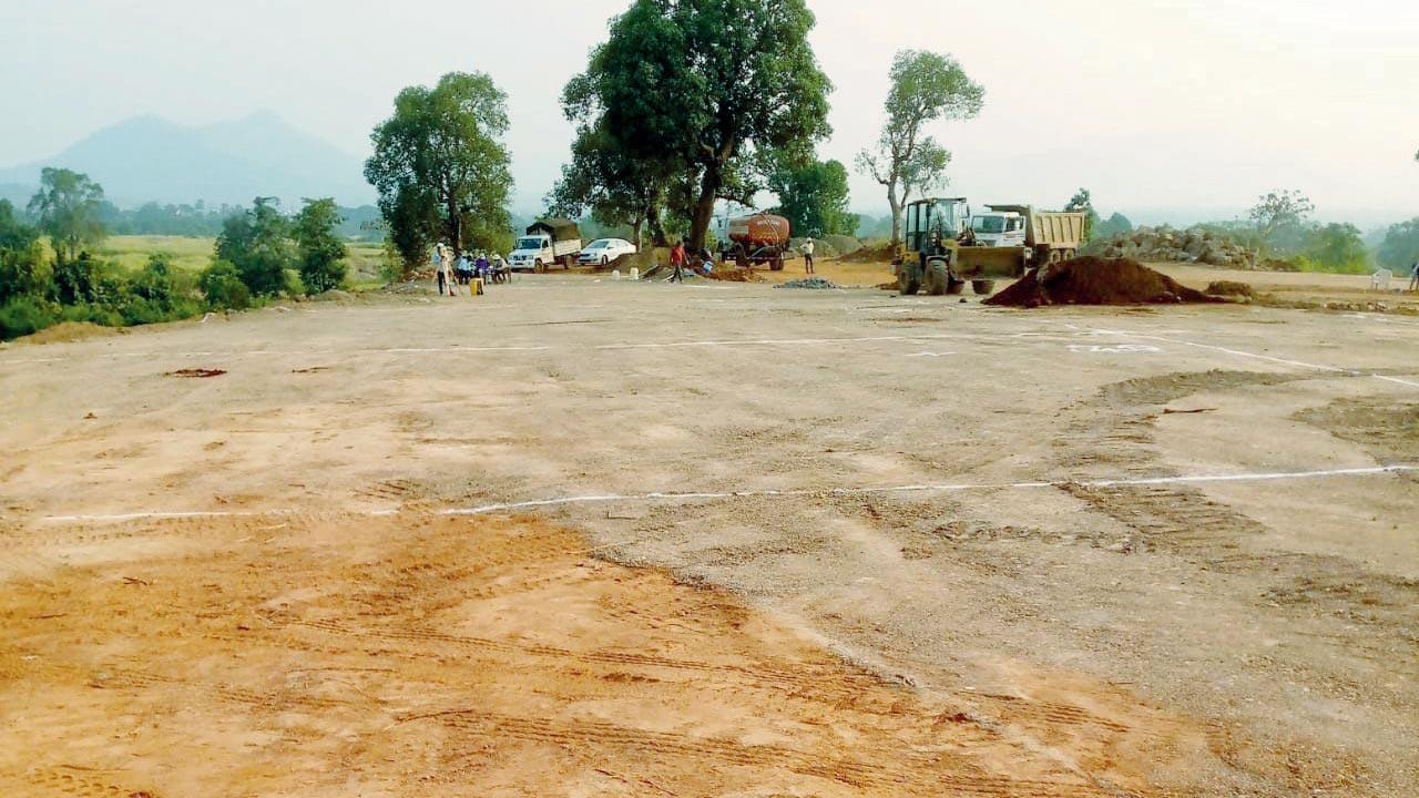 Land levelling work is going on at the construction site