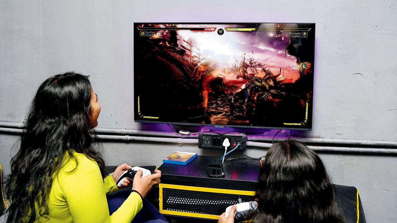 The writer tries a game of Mortal Kombat 11 on the console 