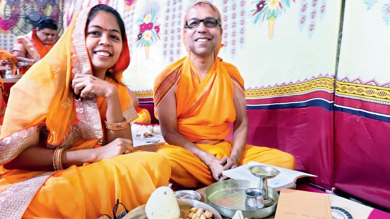 Jitendra and Amita Shah offer a laddoo of sugar at their Derasar. The round shape of the laddoo symbolises the human soul, which has no beginning and no end