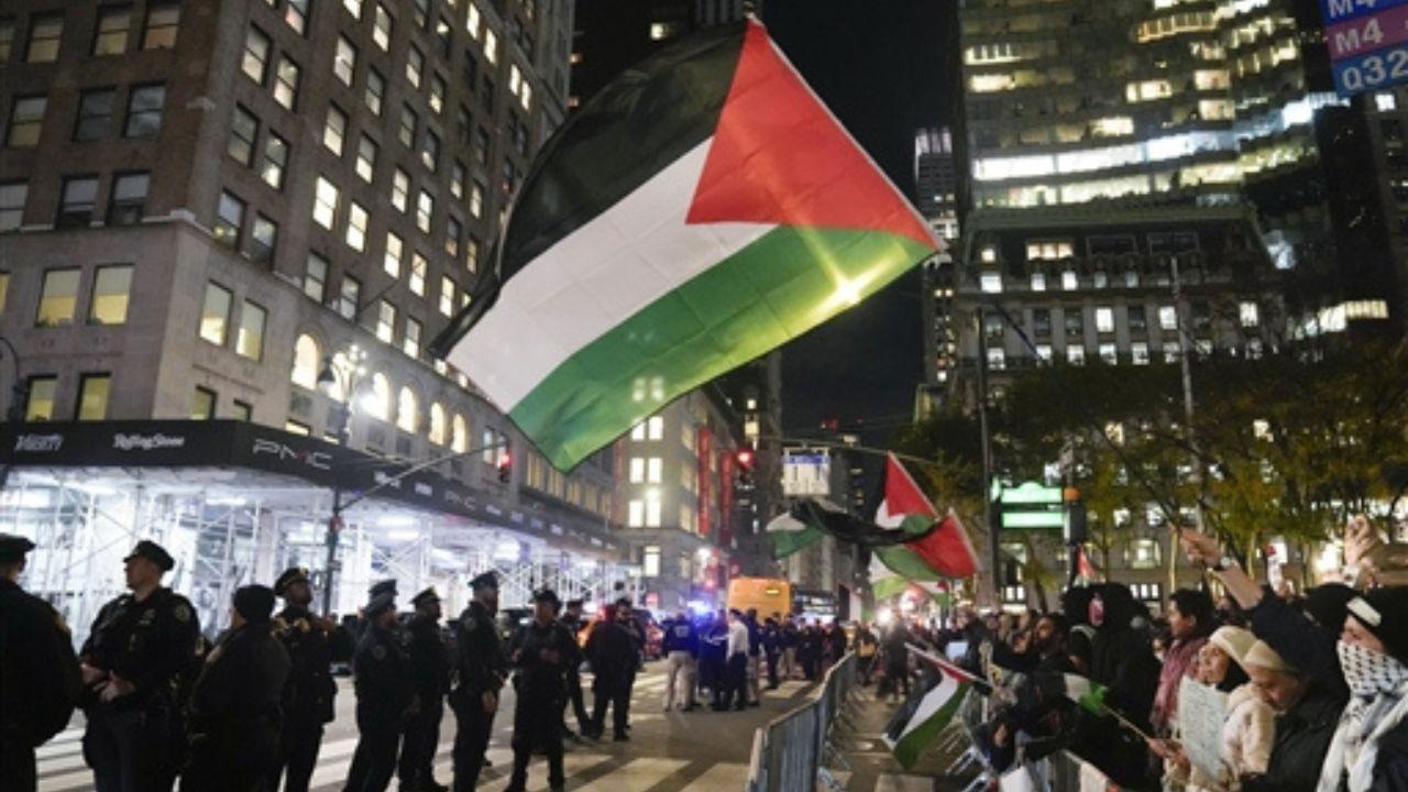 Roughly 1,500 protesters gathered in New York City on Thursday night, demanding an end to the Israel-Hamas war. Pics/ AP & AFP