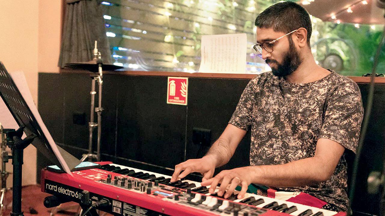 Niranjan Joshi plays the keyboard