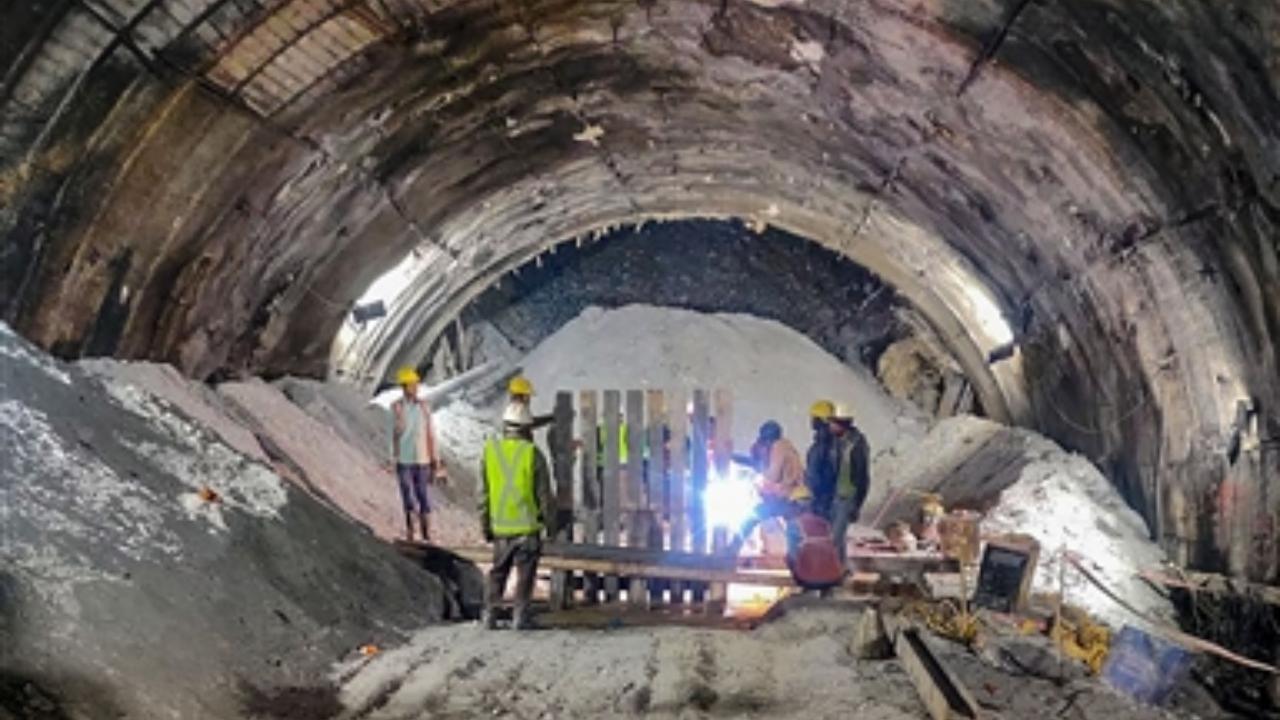 800-900 mm diameter MS pipes being inserted through the rubble inside Silkyara tunnel to prepare an escape passage for trapped workers who were trapped inside after a portion of an under-construction tunnel collapsed, in Uttarkashi district