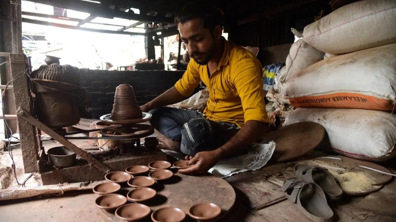 Visiting the bylanes in Dharavi, one can see the potters making traditional Diwali lamps on the power wheel, painting them, or packing them after giving them the final touches