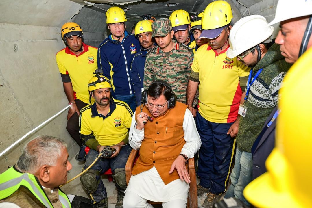 In Photos: Uttarakhand CM Dhami talks to labourers trapped inside tunnel