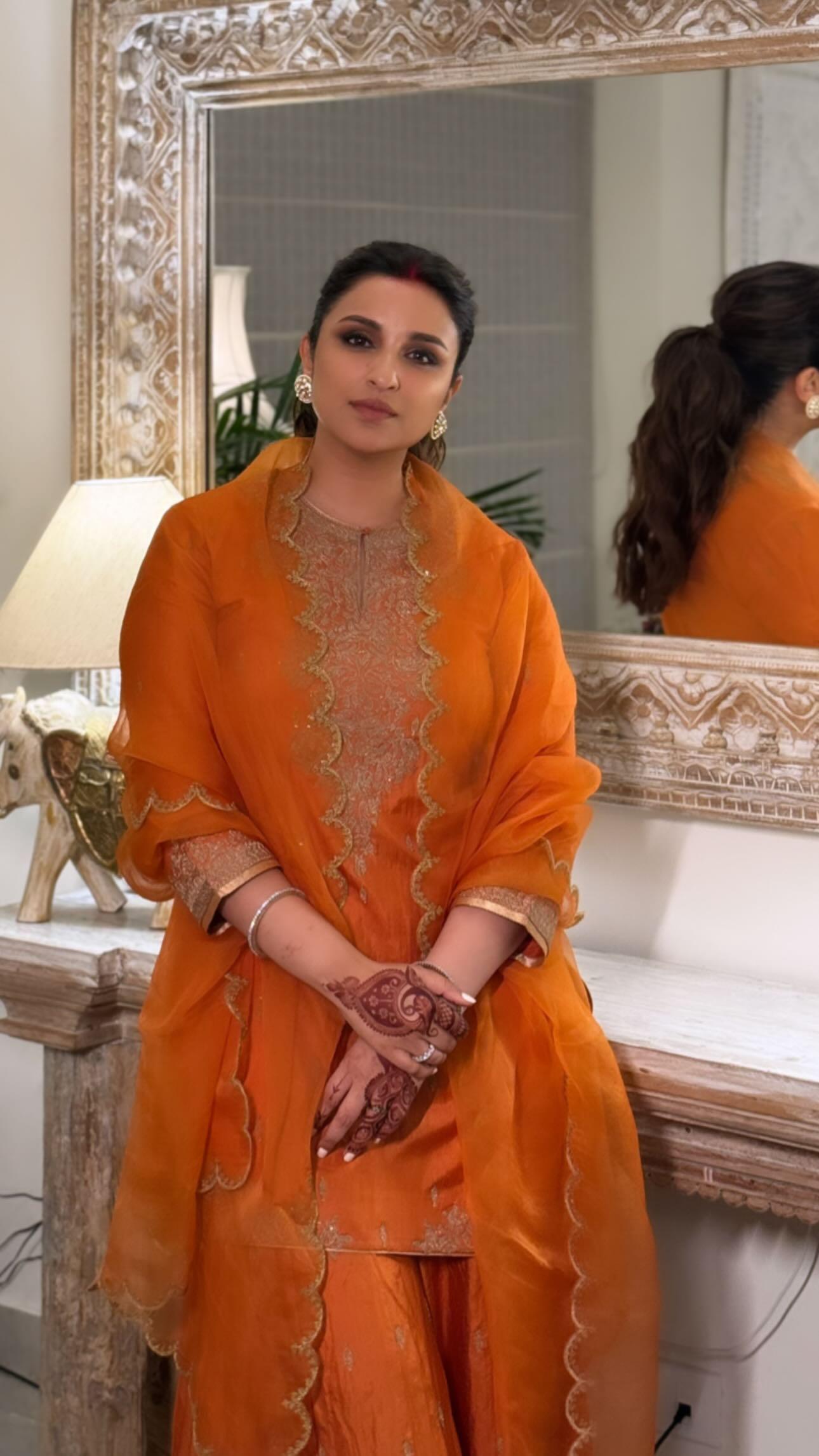 You neither want to wear a suit nor a saree? No problem, we got you covered. Parineeti's heavily embroidered orange suit is perfect for your Diwali look